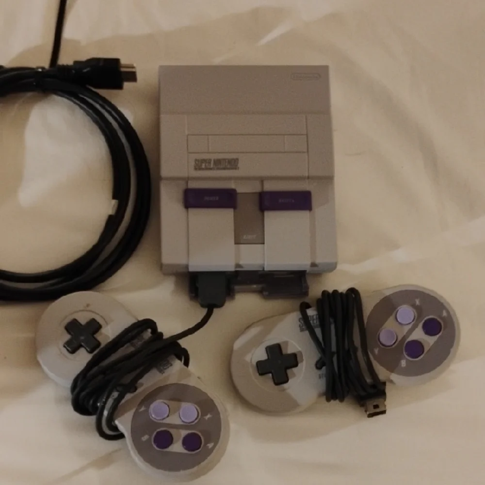 Nintendo Console with Gray and Purple Design